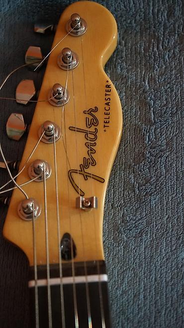 бас гитара: Электрогитара Fender Telecaster (лик с логотипом Fender), в комплекте — 4