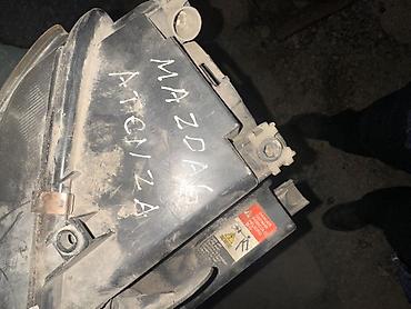 Передние фары: Передняя левая фара Mazda Оригинал — 2