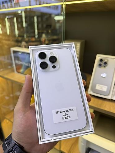 aiphone 14: IPhone 16 Pro, 256 ГБ, белый/светло‑серый цвет. На стикере указана — 1