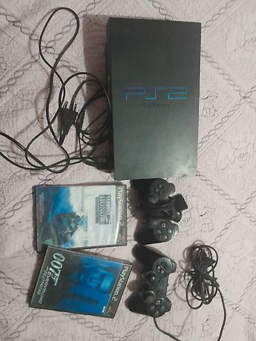 par qazan: PlayStation 2 (PS2) oyun konsolu dəsti Paketə daxildir: - PS2 konsolu — 1