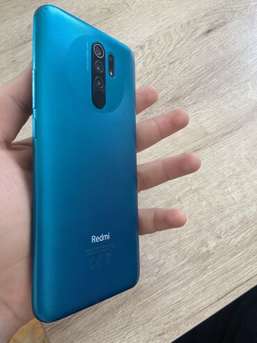 telefon ekran: Xiaomi Redmi 9, 4 GB, цвет - Голубой, 
 Отпечаток пальца, Две SIM карты