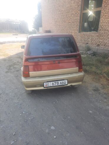 дишовые машины: Автомобиль Daewoo Tico в двухцветном исполнении: бордовый верх и