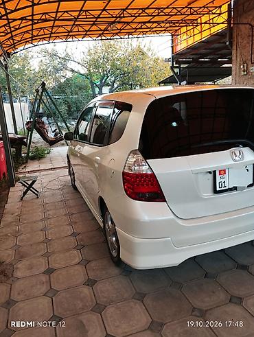 100 с4: Honda Fit: 2004 г., 1.3 л, Автомат, Бензин, Хэтчбэк — 6