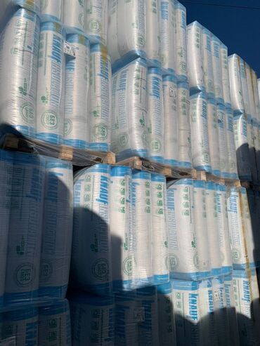 изоляционные материалы: Рулоны минеральной ваты Knauf Insulation в полиэтиленовой упаковке