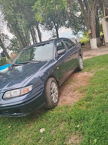 smart plus: Mazda 626: 1997 г., 1.8 л, Механика, Седан — 2