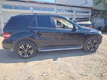 ag 07 sekilleri: Mercedes-Benz ML-Class (W164) SUV Xüsusiyyətlər: - Kuzov: 5 qapılı — 6