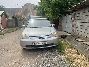 Другой транспорт: Honda Civic седан, поколение VII ( 2002 гг.), серебристый цвет — 1