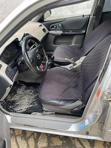 аренда mazda 323: Mazda 323: 2003 г., 1.4 л, Механика, Бензин, Седан — 5