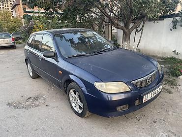 m 111: Mazda 626: 2003 г., 1.3 л, Механика, Бензин — 2