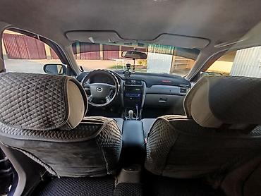 385 55: Mazda 626: 2000 г., 1.8 л, Механика, Бензин, Хэтчбэк — 6