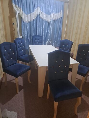 Stullar: Masa desdi satilir 270²⁰azn.Masa acilir 6 stulu var.Demek olar ki