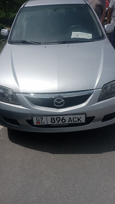 кия авто: Mazda 323: 2002 г., 2 л, Механика, Бензин, Хэтчбэк