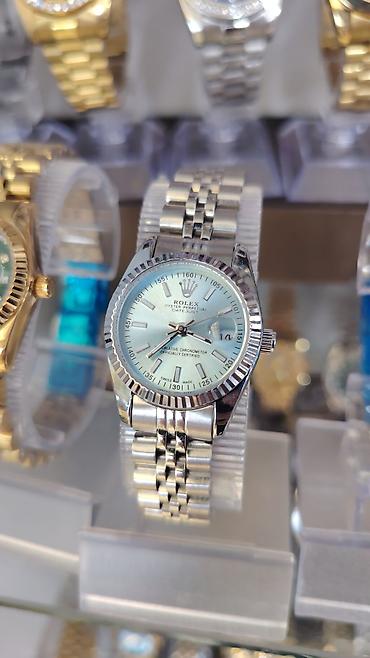 3d saat: Qızılı rəngdə klassik dizaynlı qol saatı - Model: “Oyster Perpetual — 6