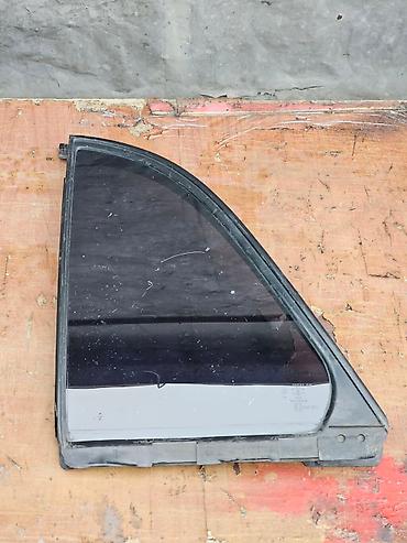 Стекла и комплектующие: Стекло Заднее левое Mazda, 2000 г., Б/у, Оригинал — 2