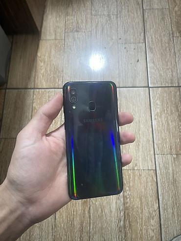 Мобильные телефоны и аксессуары: Samsung Galaxy A30, цвет - Черный, Отпечаток пальца — 2