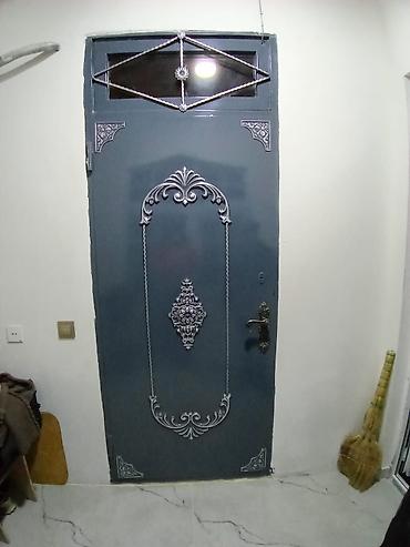 qapi bezekleri: Metall giriş qapısı - Material: qalın metaldan (polad) hazırlanmış — 1