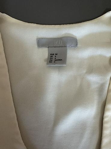muncuq: Qadın bluz/top dəsti Hər biri 5 azn 1) H&M krem rəngli, V-yaxalı — 2