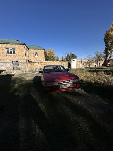 daewoo lassetti: Автомобиль седан красного цвета. Кузов с низким профилем, характерная — 1