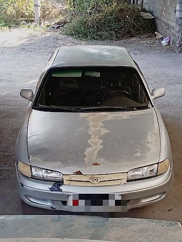 golf variant: Mazda 626: 1992 г., Механика, Бензин, Лифтбек — 6