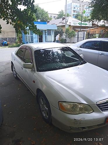 клима: Mazda Millenia: 2001 г., Автомат, Бензин, Седан — 1