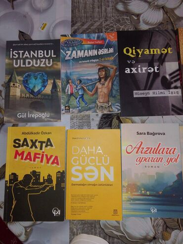 Digər kitablar və jurnallar: Yeni kitablardı. Bir çoxsu demək olar ki, açılmayıb. Qiymətlərindən