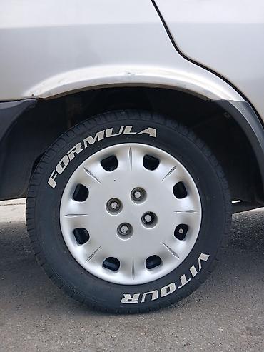 Şin və təkərlər: İşlənmiş Şin Formula 215 / 50 / R 13 — 8