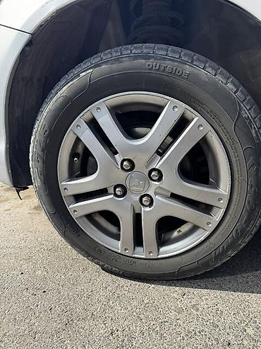диски на хонду: Комплект из 4 легкосплавных дисков Honda с шинами. Характеристики: - — 1