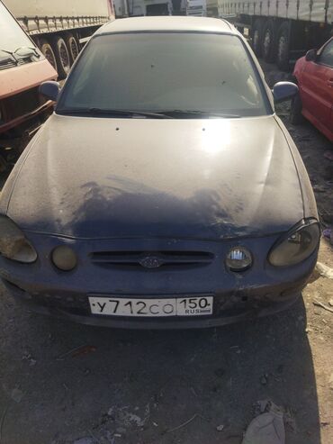Двигатели, моторы и ГБЦ: Бензиновый мотор Kia 1997 г., 1.8 л, Б/у, Оригинал