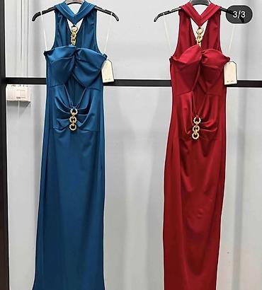 afro: Elegantna haljina – model sa izrezom i zlatnim detaljima koja — 3