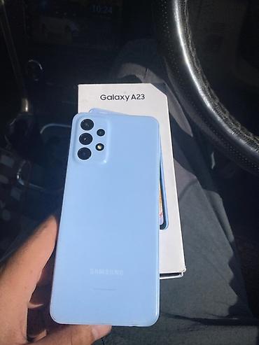 tab 10: Смартфон Samsung Galaxy A23, голубой цвет. Основные особенности: - — 1