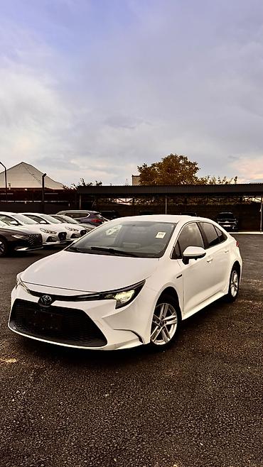 Toyota Corolla: 2022 г., 1.8 л, Автомат, Гибрид, Седан