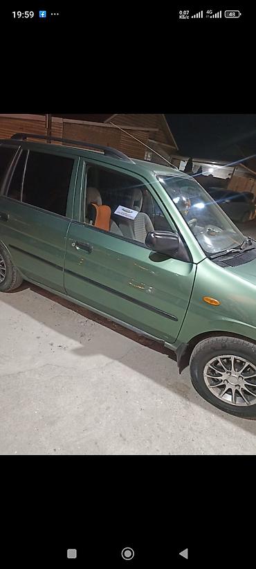cx 9: Mazda Demio: 2000 г., 1.5 л, Автомат, Бензин, Минивэн — 5