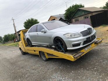 машины токмока: Көтөргүсү менен, Гидроманипулятору менен, Кыймылдуу платформасы менен