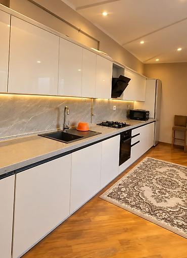 Metbex mebeli uzeri mermer 550₼ .Uzerinde moyka verilir .Olcu 6 metr