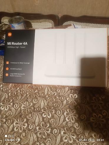 simsiz internet baki: Məhsul: Xiaomi Mi Router 4A - Sürət: 1200 Mbps High-Speed - Standart — 1