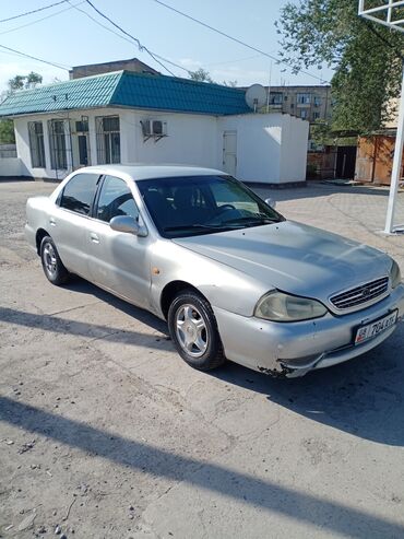 купить машину хендай солярис: Kia Clarus: 1998 г., 1.8 л, Механика, Бензин