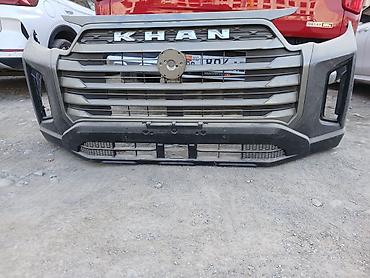 задание фары: Передний бампер с решеткой радиатора для пикапа SsangYong Rexton — 1