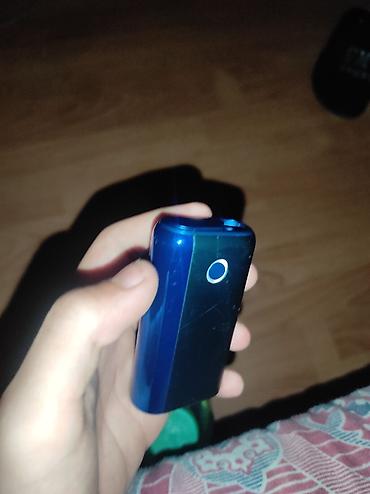 Məhsul: Kompakt elektron siqaret (vape) qurğusu – göy/yaşıl rəng