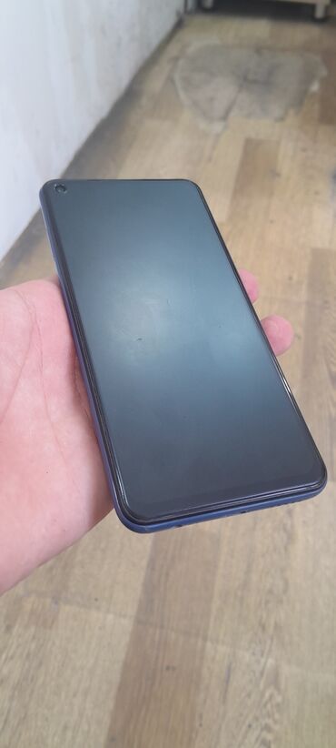телефон fly fs521 power plus 1: Xiaomi Redmi Note 9, 64 ГБ, цвет - Синий, 
 Отпечаток пальца, Две SIM карты, Face ID
