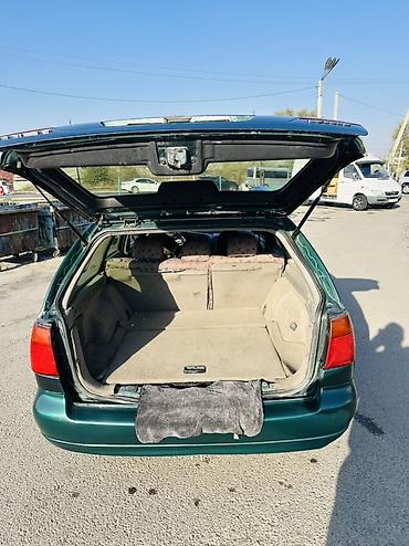 mazda 323 2003: Nissan Primera: 2001 г., 1.8 л, Механика, Бензин, Универсал — 8