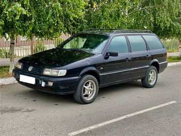 ваз 21115: Автомобиль Volkswagen Passat в кузове универсал, окрашенный в черный