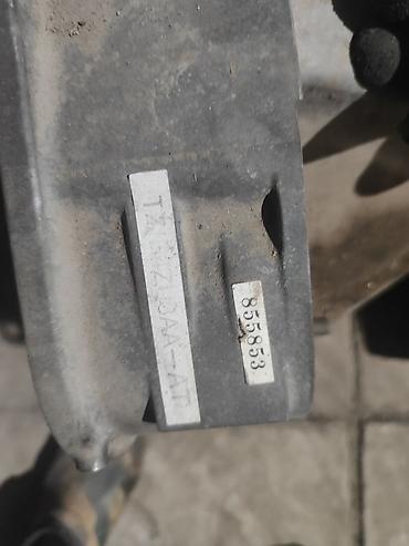 8 4: АКПП Ford, номер по ярлыку: 7L2J‑BAA‑AT. На корпусе также отметка — 1