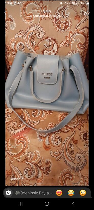 qadin pencekleri: Çanta dəsti, Guess