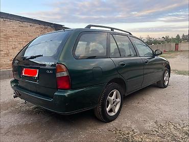 пш метр: Mitsubishi Lancer: 1999 г., 1.6 л, Кол менен иштөөчү, Бензин, Универсал — 8