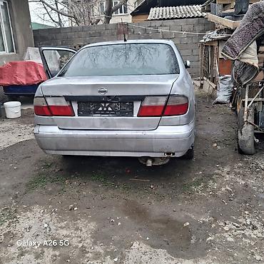 chek it: Nissan Primera: 1996 г., Автомат, Бензин, Седан — 3