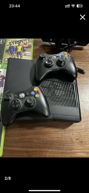 Xbox 360 with 8 games and 2 controllers + 1 Kinect and cables. Η