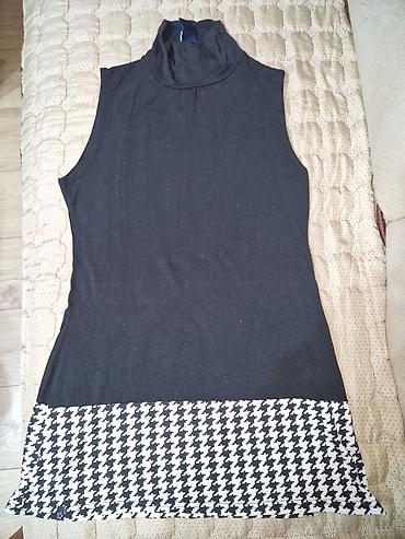 Set od 4 ženske letnje majice/tunike. U setu se nalaze: - Roze — 2