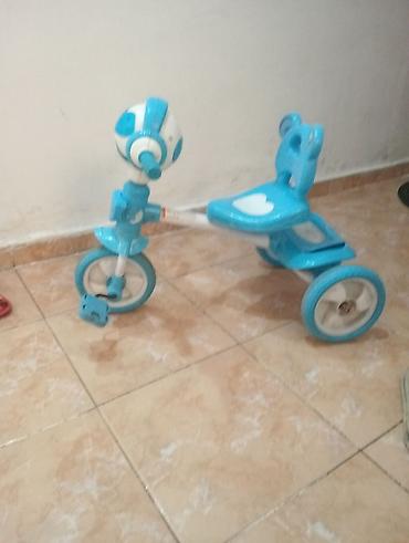 velosiped 3 teker: Uşaq üçtəkərli velosipedi – mavi/ağ rəngdə.batareya ilə mahnı yeri də — 2