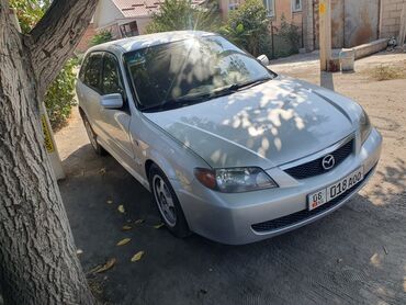с моей доплатой: Mazda 323: 2003 г., 2 л, Автомат, Газ, Хэтчбэк