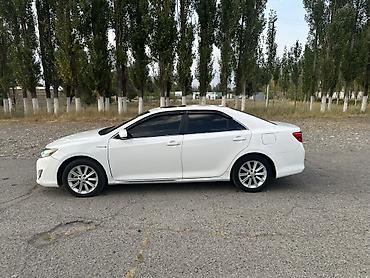голы 3 купе: Toyota Camry: 2013 г., 2.5 л, Гибрид, Седан — 9